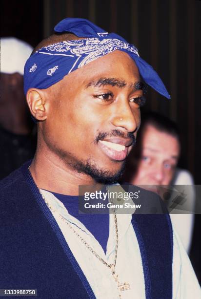 View of American rapper and actor Tupac Shakur as he attends a movie premiere, New York, New York, 1996.