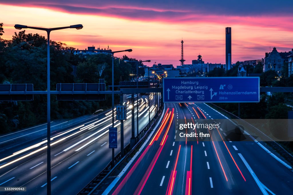 Berlin skyline with city highway at sunset (Germany)