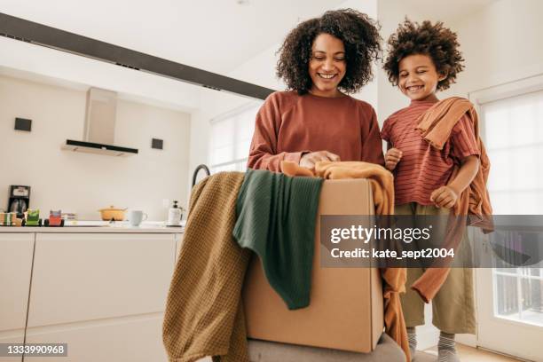 how to encourage your kids to do household chores - donation box stock pictures, royalty-free photos & images