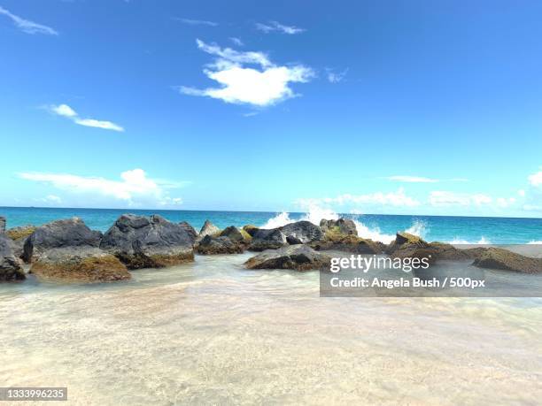 scenic view of sea against blue sky,san juan,puerto rico - san juan puerto rico stock-fotos und bilder