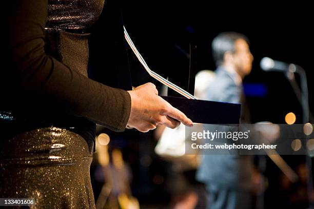 giving award - awards ceremony stock pictures, royalty-free photos & images