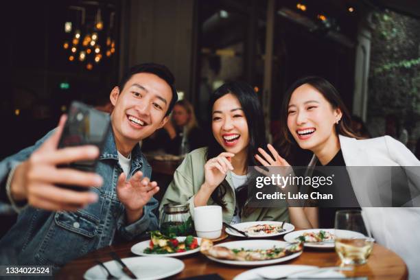 fun lunch gathering - three people selfie stock pictures, royalty-free photos & images