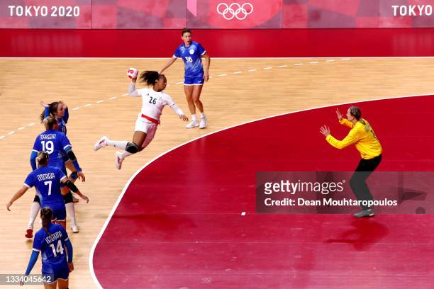 Pauletta Foppa of Team France shoots at goal as Anna Sedoykina of Team ROC looks to save during the Women's Gold Medal handball match between ROC and...