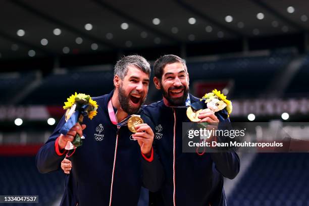 Brothers, Luka Karabatic and Nikola Karabatic of Team France pose after the medal ceremony for Men's Handball after winning the gold medal on day...