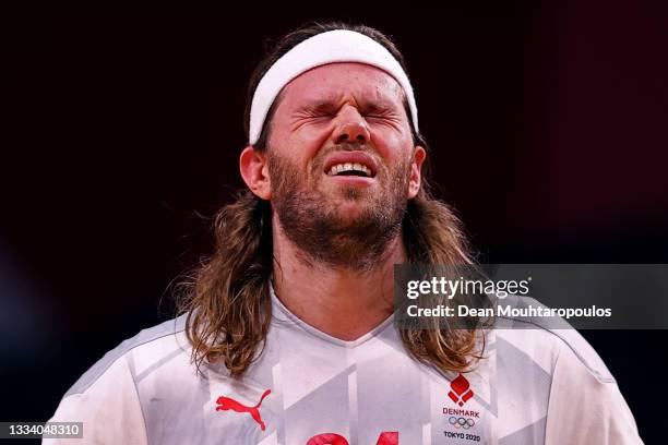 Mikkel Hansen of Team Denmark looks dejected after being defeated by Team France in the Men's Gold Medal Match on on day fifteen of the Tokyo 2020...