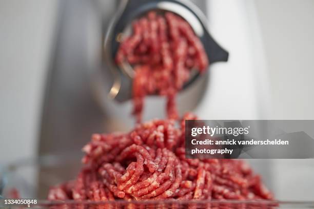 grinding short ribs - ground beef stock pictures, royalty-free photos & images