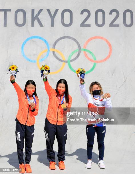 Silver medalist Kokona Hiraki of Team Japan, gold medalist Sakura Yosozumi of Team Japan and Sky Brown of Team Great Britain pose after the medal...