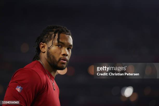 Quarterback Kyler Murray of the Arizona Cardinals watches from sidelines during the first half of the NFL preseason game against the Dallas Cowboys...