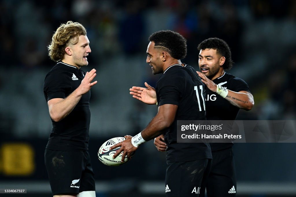Australian Rugby Reece Sevu Reece of the All Blacks is congratulated on his trry by Damian ...