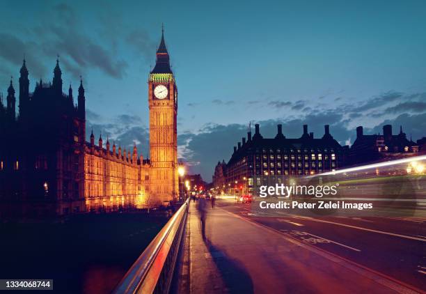 big ben in london - london by night stock pictures, royalty-free photos & images