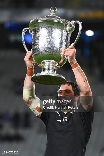 Sam Whitelock of the All Blacks celebrates with the Bledisloe Cup following The Rugby Championship and Bledisloe Cup match between the New Zealand...