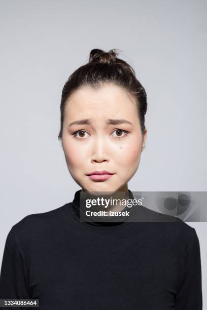 sad asian young woman - crying portrait stock pictures, royalty-free photos & images