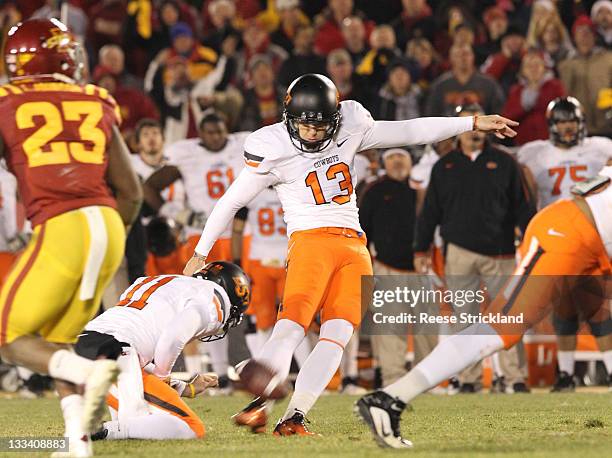 Quinn Sharp of the Oklahoma State Cowboys misses a field goal that would have won the game in the fourth quarter against the Iowa State Cyclones at...