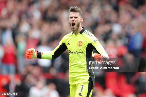 David de Gea of Manchester United celebrates after their side's third goal scored by Bruno Fernandes during the Premier League match between...