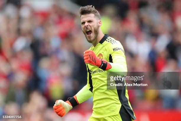 David de Gea of Manchester United celebrates after their side's third goal scored by Bruno Fernandes during the Premier League match between...