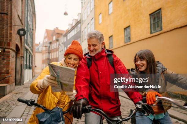 looking for our next sightseeing spot - copenhagen bicycle stock pictures, royalty-free photos & images