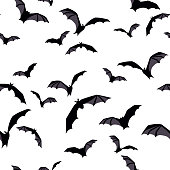 Halloween seamless background with bats on white. Vector illustration.