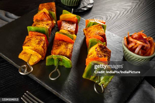 paneer tikka with mint chutney and onion rings - paneer tikka stock pictures, royalty-free photos & images