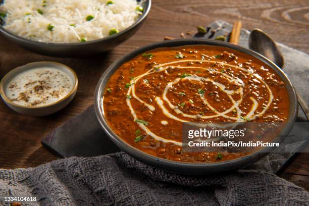 dal makhni with rice and raita (curd) and onion rings. - dal stock pictures, royalty-free photos & images