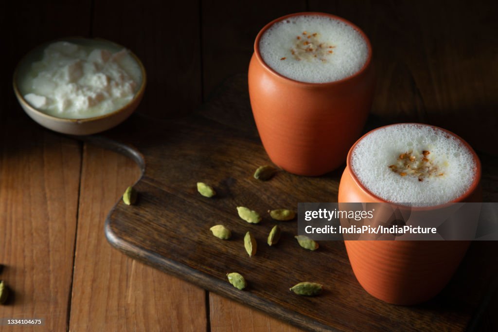 Butter milk in a ethan glass with cardamom