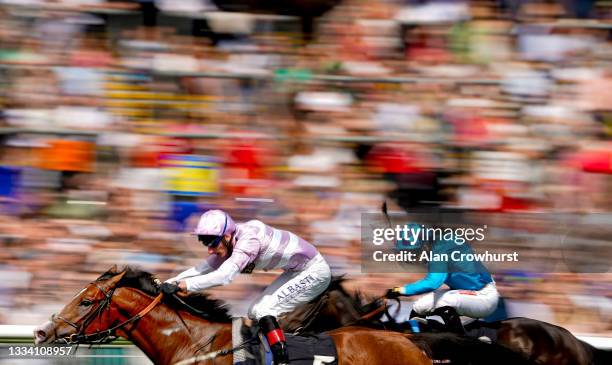 Adam Kirby riding Aratus win The BetVictor Handicap at Newbury Racecourse on August 14, 2021 in Newbury, England.