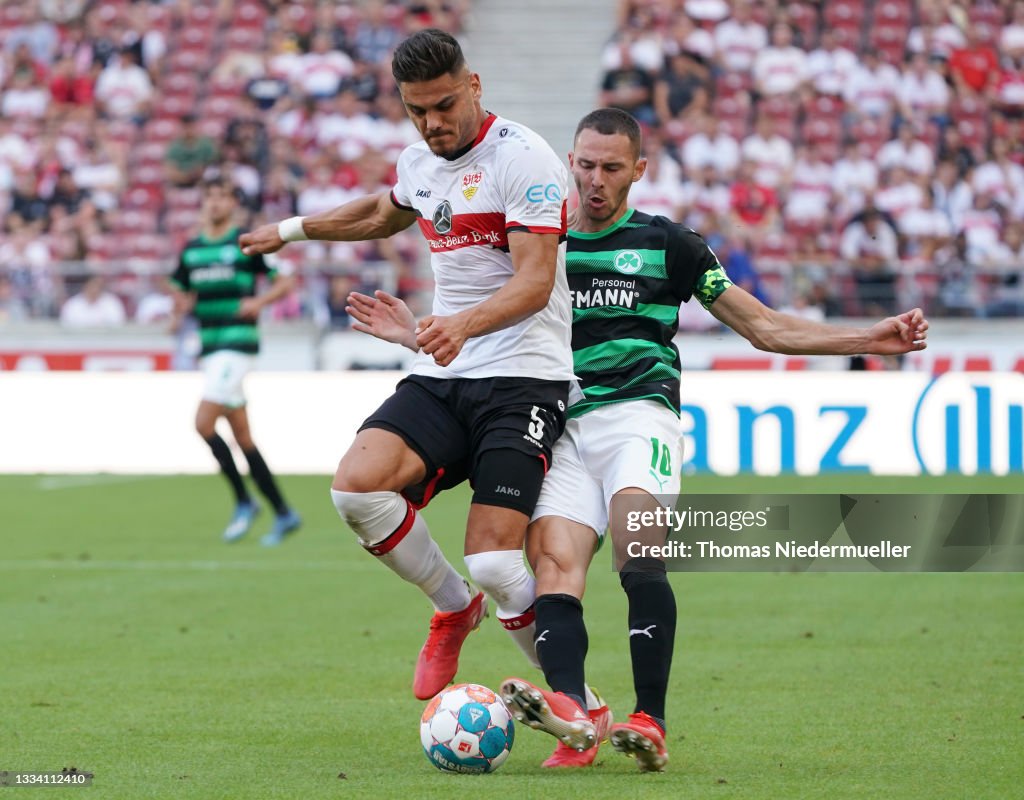Konstantinos Mavropanos of VfB Stuttgart is challenged by Branimir ...