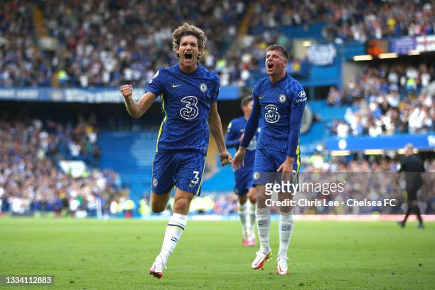 Marcos Alonso of Chelsea celebrates with teammate Mason Mount after scoring their side's first goal during the Premier League match between Chelsea...
