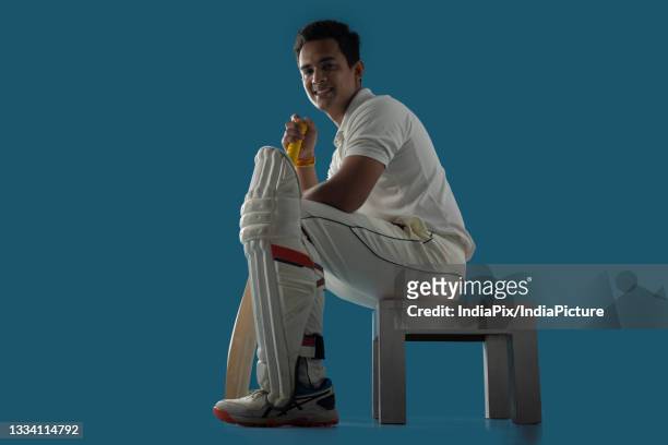 a batsman, cricketer sitting in dressing room - cricket player stock pictures, royalty-free photos & images