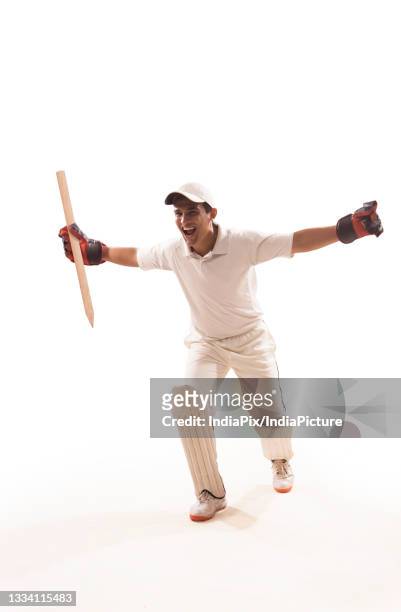 cricketer, wicket keeper celebrating - cricket player white background stock-fotos und bilder