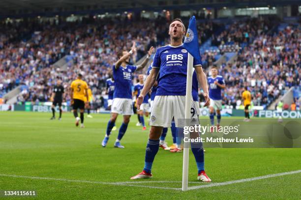 Jamie Vardy of Leicester City celebrates after scoring their side's first goal during the Premier League match between Leicester City and...