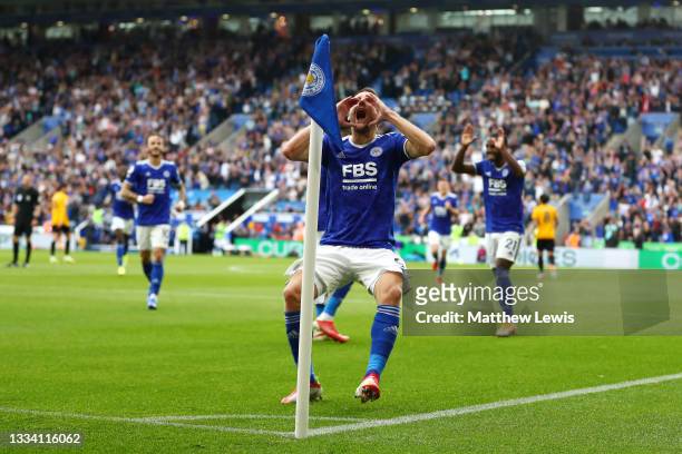 Jamie Vardy of Leicester City celebrates after scoring their side's first goal during the Premier League match between Leicester City and...