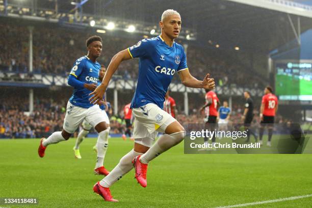 Richarlison of Everton celebrates after scoring their side's first goal during the Premier League match between Everton and Southampton at Goodison...