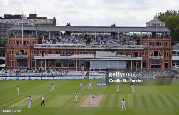 General view of the England batsman Joe Root celebrating his 100 during day three of the Second Test Match between England and India at Lord's...