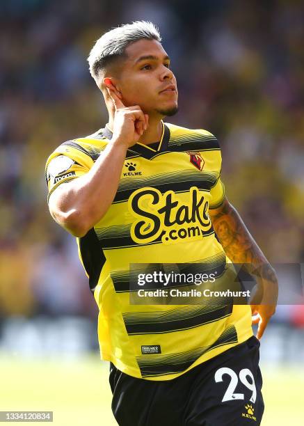 Cucho Hernandez of Watford celebrates after scoring their side's third goal during the Premier League match between Watford and Aston Villa at...