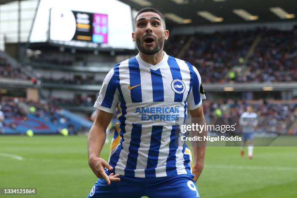 Neal Maupay of Brighton and Hove Albion celebrates after scoring their side's first goal during the Premier League match between Burnley and Brighton...