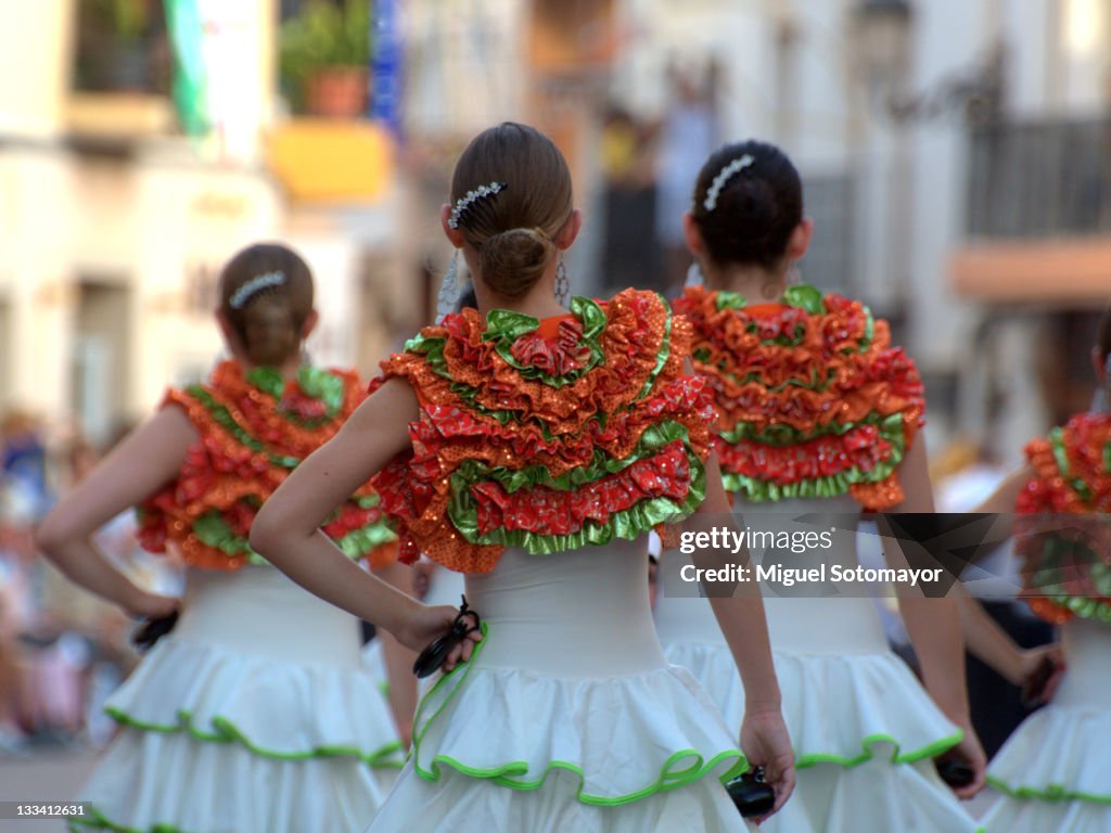 Women dressed as "flamencas" in parade