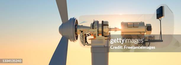cross section of large commercial wind turbine at sunset 3d render - cross section stock-fotos und bilder