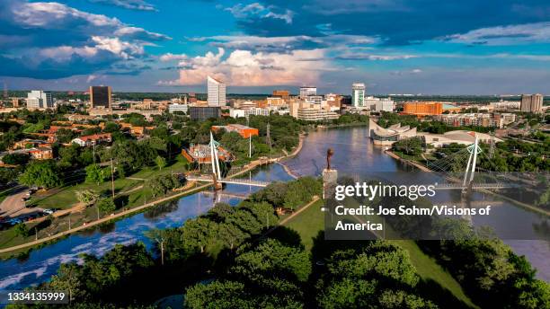 drone aerial view of downtown wichita skyline, kansas - wichita stock-fotos und bilder