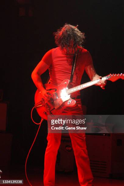 American Alternative Rock musician Jack White, of the group the White Stripes, plays guitar as he performs onstage at Irving Plaza, New York, New...