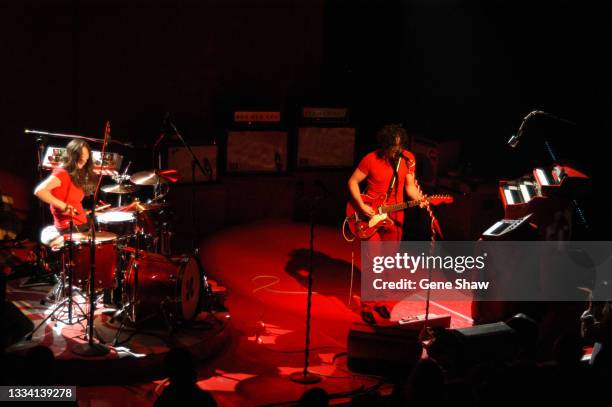 American Alternative Rock musicians Meg White , in drums, and Jack White, on guitar, both of the White Stripes, as they perform onstage at Irving...