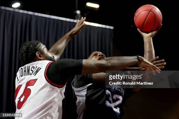 Darnell Jackson of the Power attempts a shot while being guarded by Amir Johnson of the Trilogy during BIG3 - Week Seven at the Orleans Arena on...
