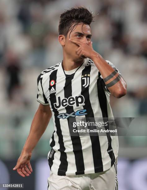 Paulo Dybala of Juventus celebrates after scoring the opening goal during the pre-season friendly match between Juventus and Atalanta BC at Allianz...