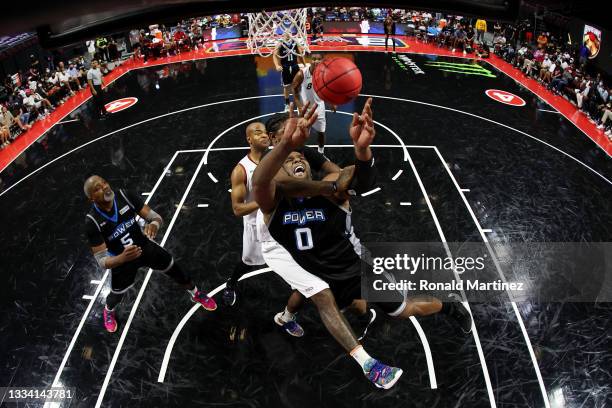 Glen Davis of the Power attempts a shot while being guarded by Amir Johnson of the Trilogy during BIG3 - Week Seven at the Orleans Arena on August...