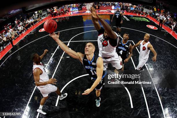 Dusan Bulut of the Power attempts a shot while being guarded by Amir Johnson of the Trilogy during BIG3 - Week Seven at the Orleans Arena on August...