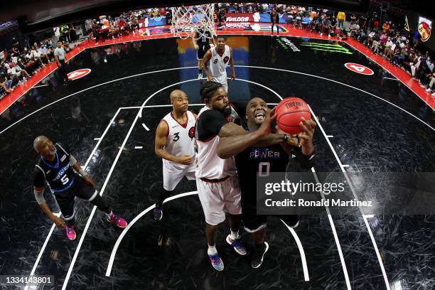 Glen Davis of the Power attempts a shot while being guarded by Amir Johnson of the Trilogy during BIG3 - Week Seven at the Orleans Arena on August...