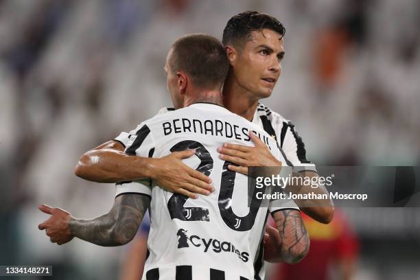 Federico Bernardeschi of Juventus celebrates with team mate Cristiano Ronaldo after scoring to give the side a 2-1 lead during the Pre-Season...