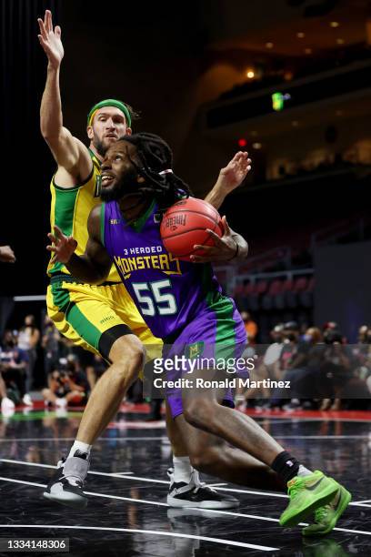 Kevin Murphy of the 3 Headed Monsters dribbles the ball while being guarded by Spencer Hawes of the Ball Hogs during BIG3 - Week Seven at the Orleans...