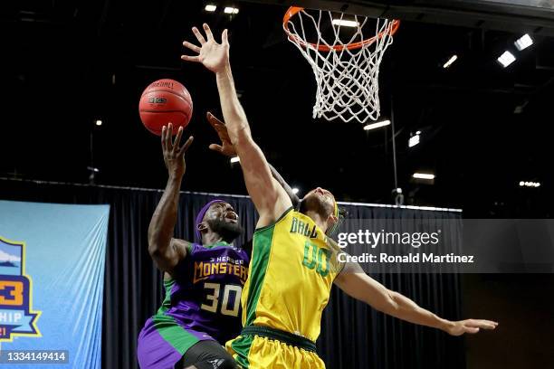 Reggie Evans of the 3 Headed Monsters attempts a shot while being guarded by Spencer Hawes of the Ball Hogs during BIG3 - Week Seven at the Orleans...