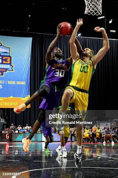 Reggie Evans of the 3 Headed Monsters attempts a shot while being guarded by Spencer Hawes of the Ball Hogs during BIG3 - Week Seven at the Orleans...
