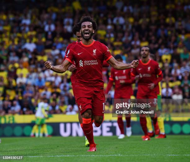 Mohamed Salah of Liverpool celebrates after scoring the third goal during the Premier League match between Norwich City and Liverpool at Carrow Road...